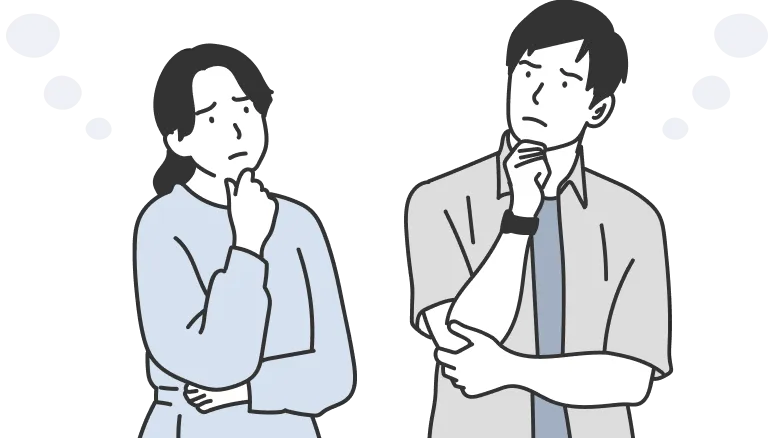 女性と男性が腕を組んで悩んでいる