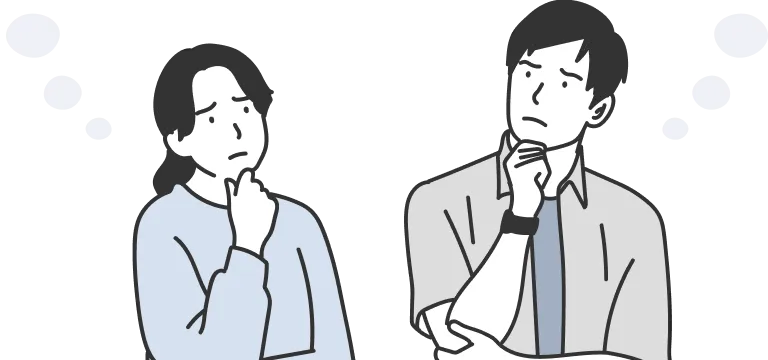 女性と男性が腕を組んで悩んでいる
